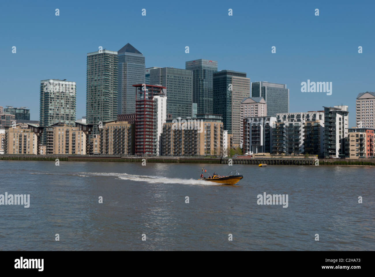 The view of Canary Wharf in The City of London from across The River Thames in Rotherhithe. Stock Photo