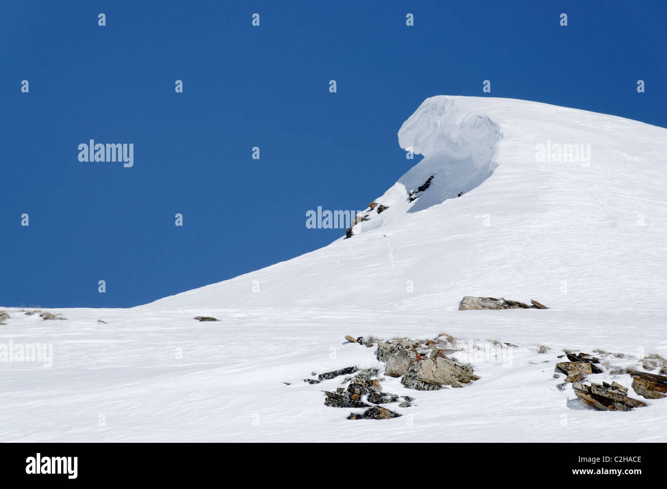 Windslab avalanche, cornice and debris in the Haute Maurienne, French Alps. Stock Photo