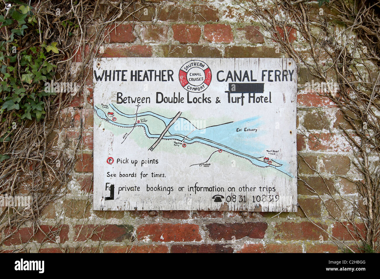 Sign for the White Heather Canal Ferry between The Double Locks pub & Turf Locks Hotel in Exeter. Stock Photo