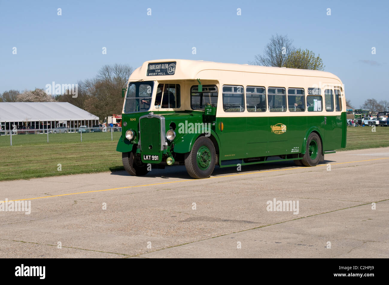 A vintage Bristol L6A bus with Eastern Coach Works (E.C.W) bodywork takes part in a parade of old buses. Stock Photo