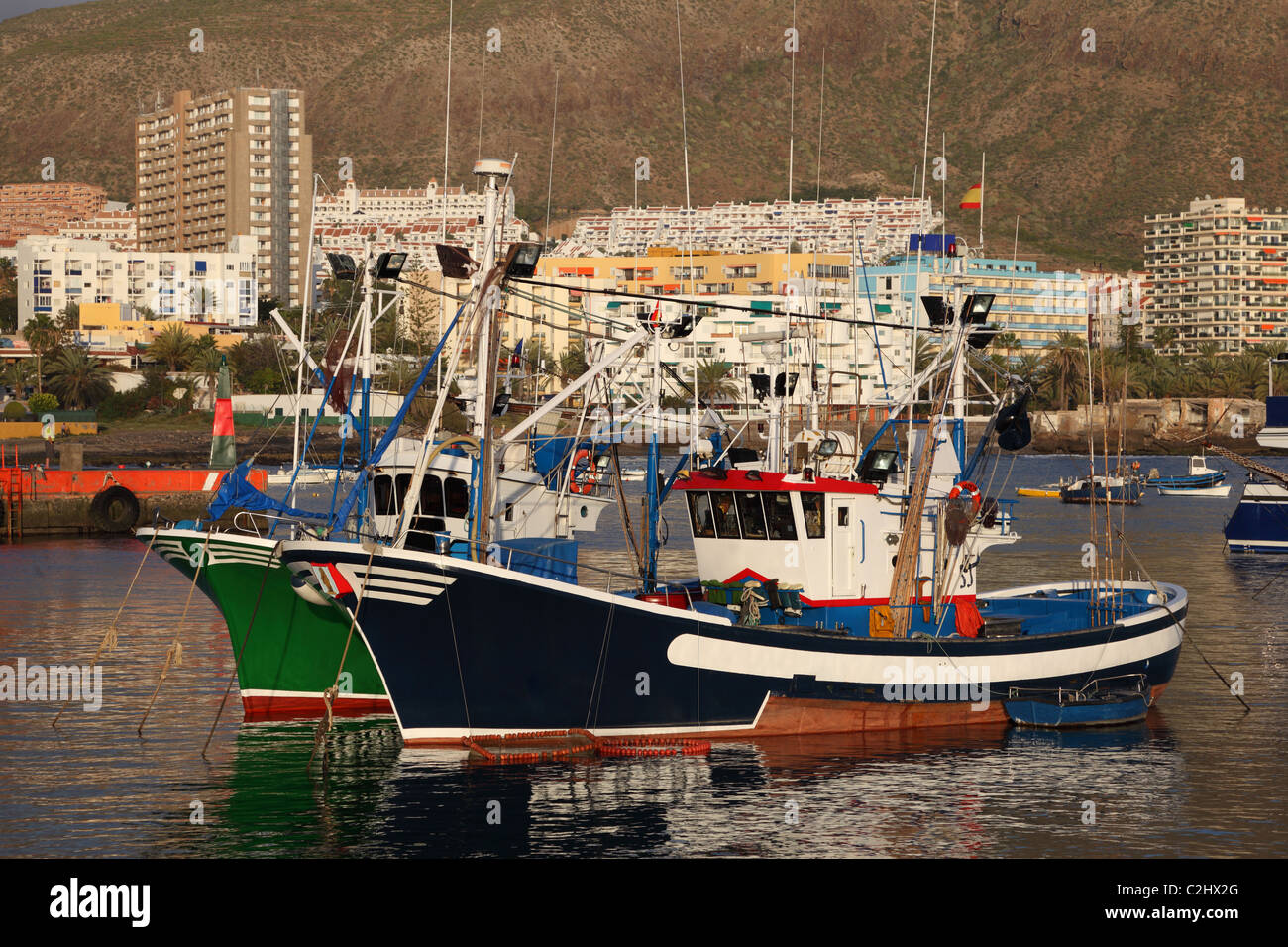 Fishing boats in the harbour of Los Cristianos, Tenerife Spain Stock