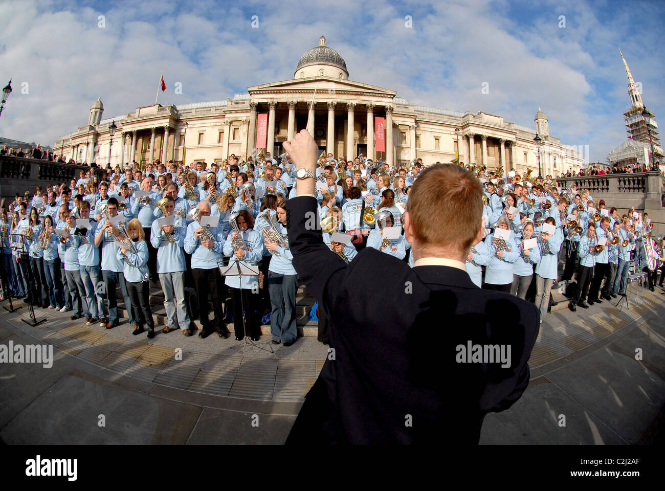 Atmosphere  Neighbours' Harold Bishop (Ian Smith) performing with more than 250 nationwide brass band players in London's Stock Photo