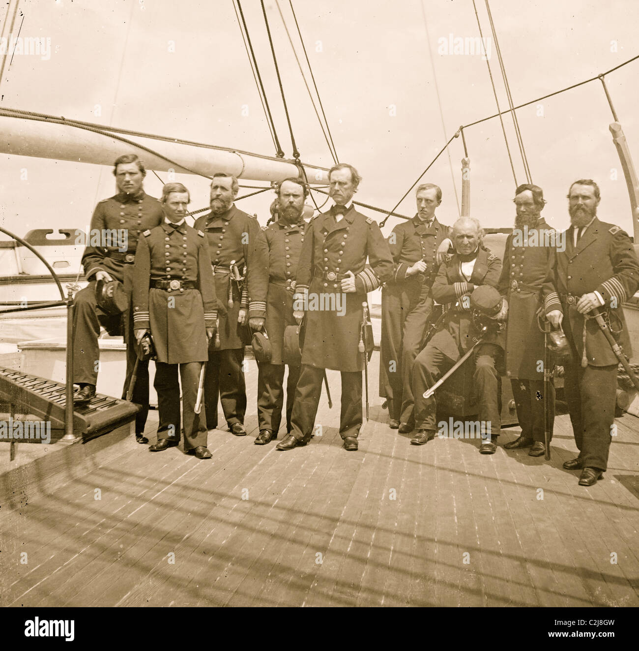 Charleston Harbor, S.C. Rear Admiral John A. Dahlgren (fifth from left) and staff aboard U.S.S. Pawnee Stock Photo