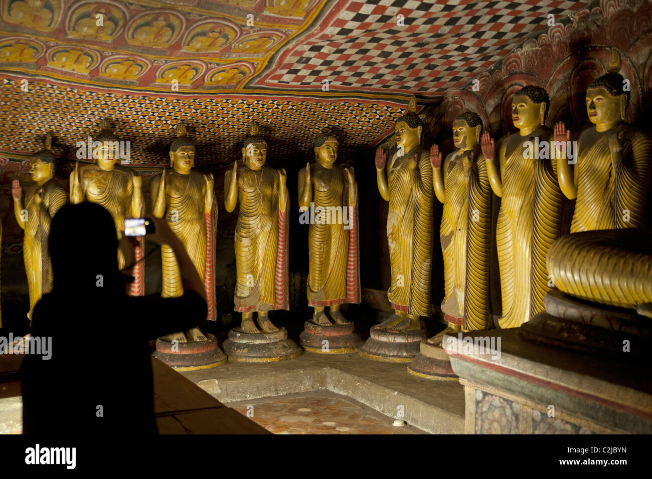 Buddha statues inside Dambulla cave temple complex in Sri Lanka Stock Photo