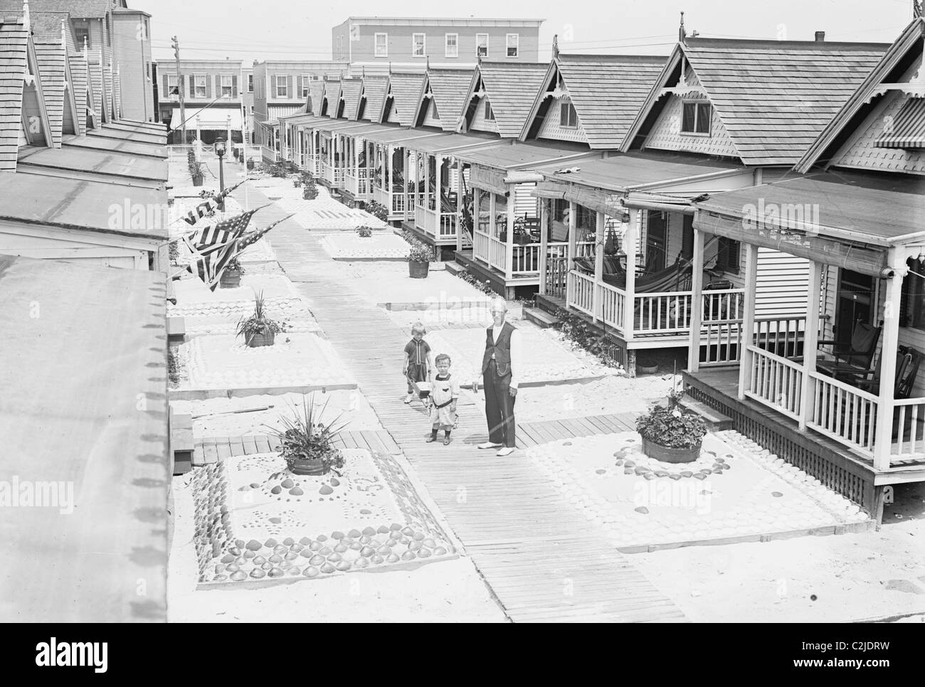 Porches and front lawns of row of bungalows, Rockaway, N.Y. Stock Photo