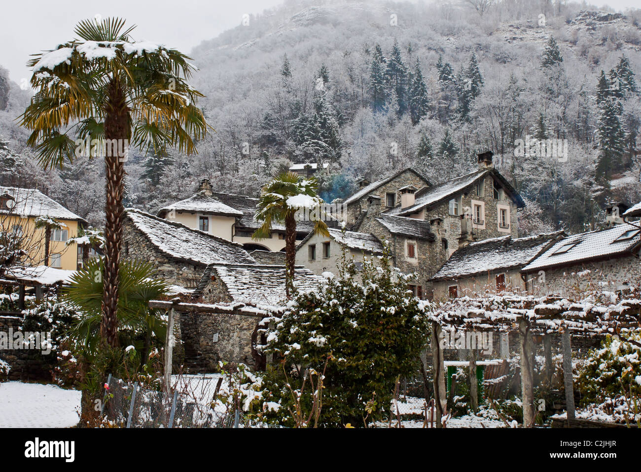Verscio - a small village in Ticino, Pedemonte, Switzerland, in the winter with snow Stock Photo