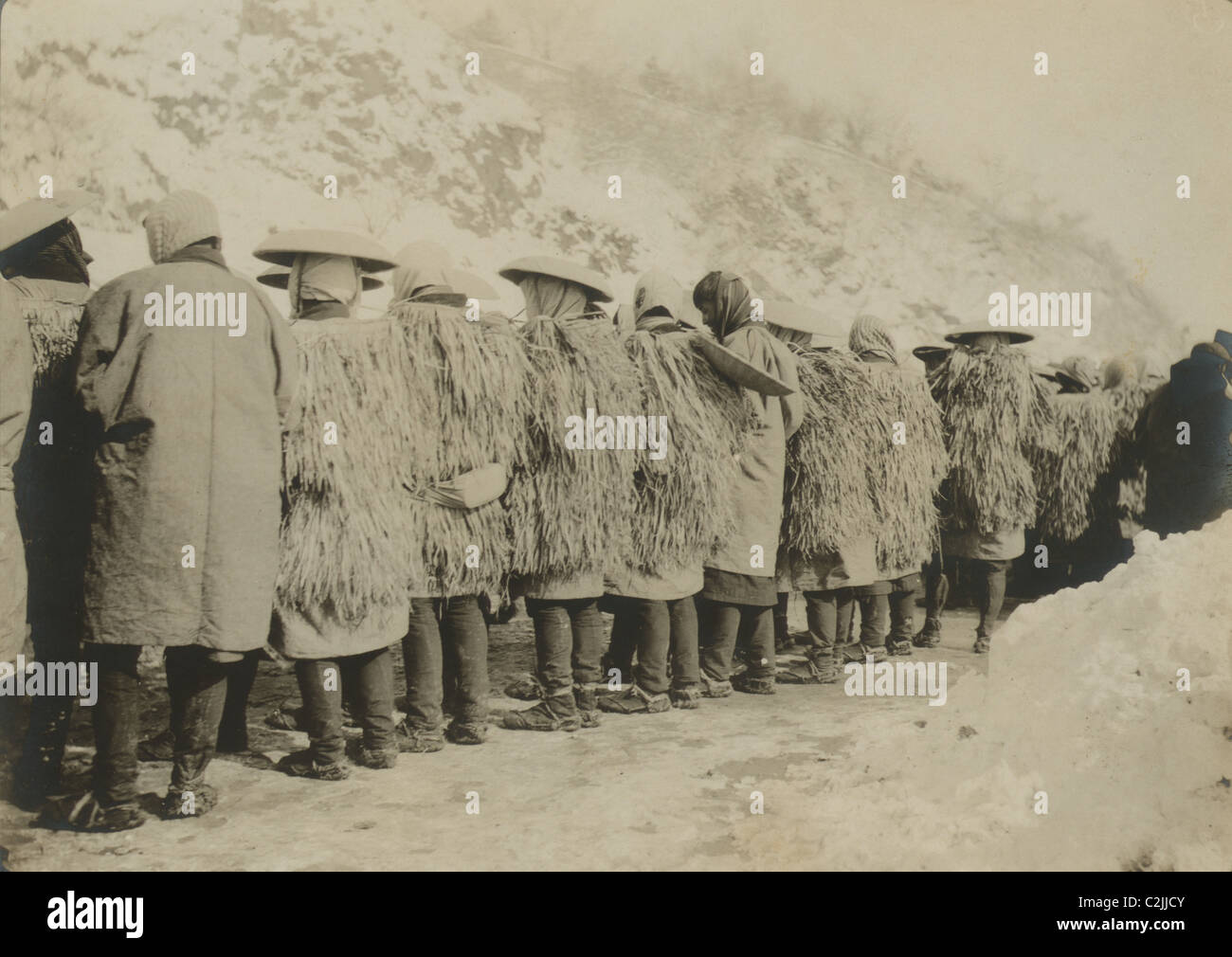 Japanese coolies in winter costume Stock Photo