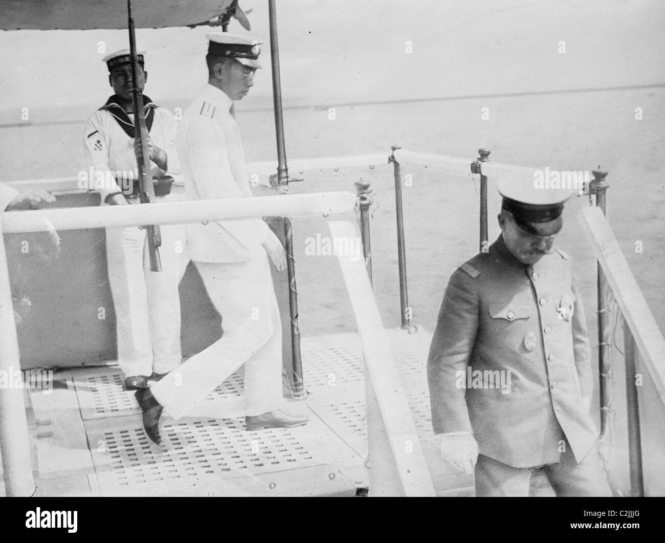 Crown Prince Hirohito Return and is Saluted by Rifle on Ship Stock Photo