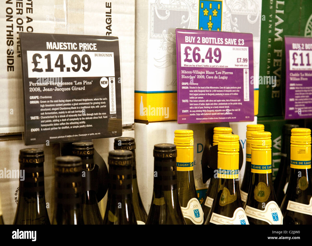 Bottles of white wine for sale in a Majestic Wine store UK Stock Photo