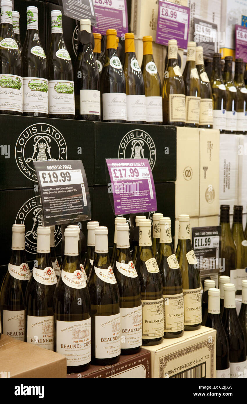 Bottles of white wine for sale in a Majestic Wine store UK Stock Photo