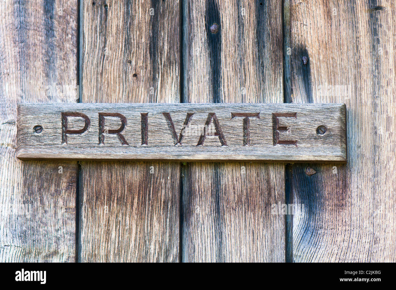 Eingangstür mit 'Privat'-Schild; Private sign at wooden door Stock Photo