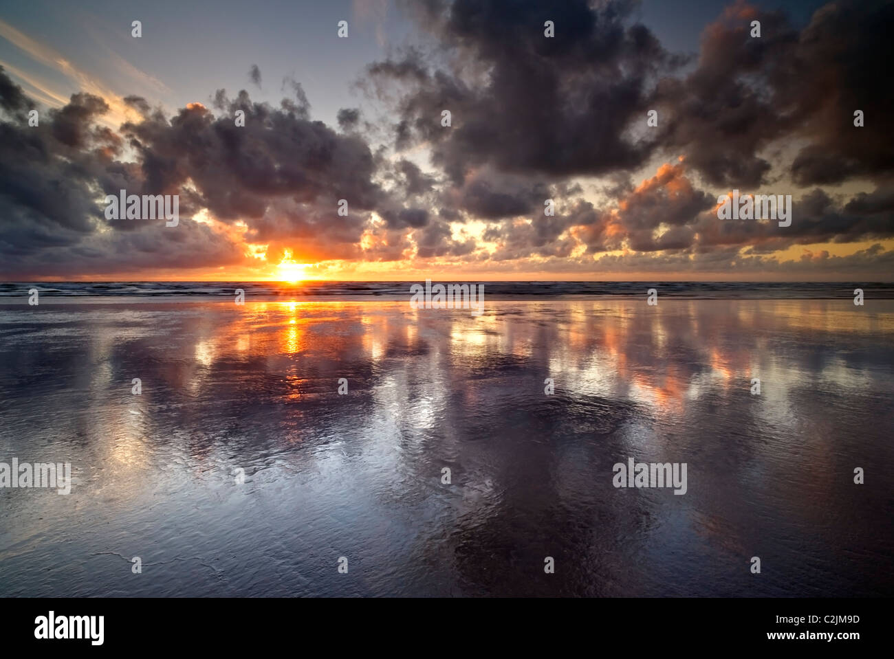 Sunset, Coastline, reflected sands, North Devon, Westward Ho! United Kingdom, England, sand, sea, dramatic, stunning, shoreline, Stock Photo