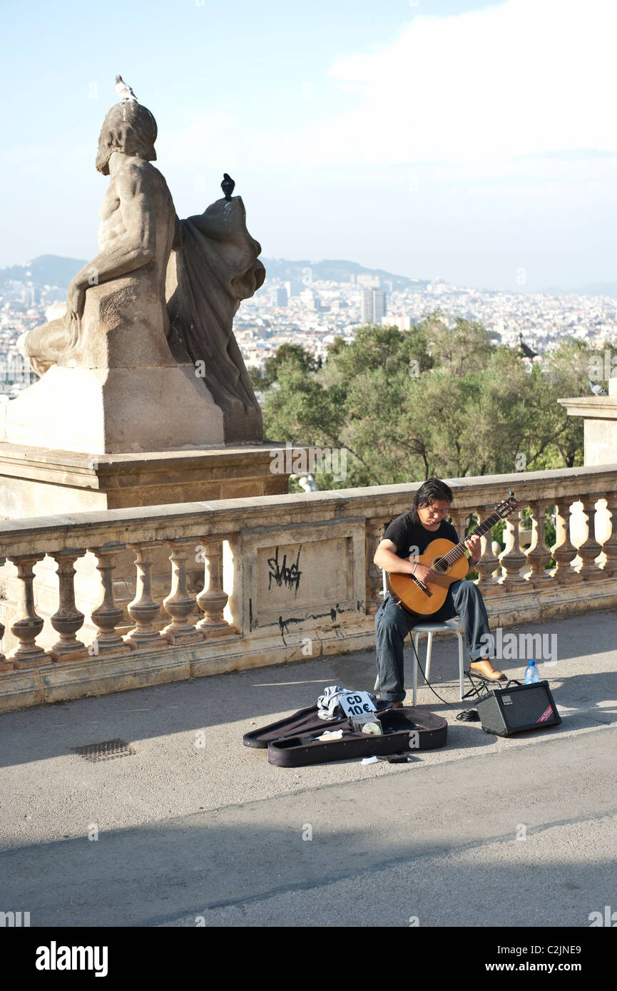 Guitar player performing in Montjuic, Barcelona, Spain Stock Photo