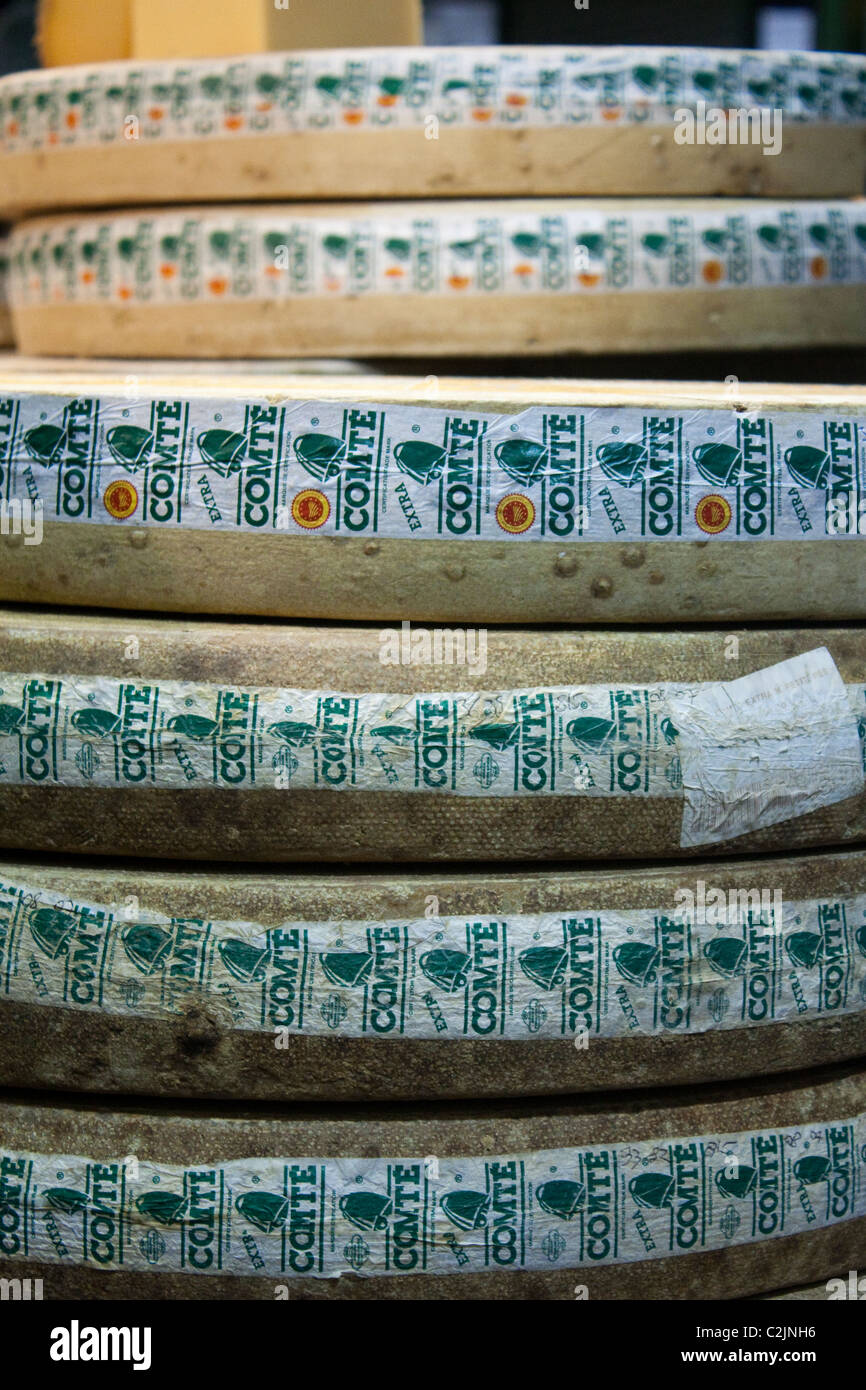 A pile of Comte cheese on display at Borough Market, London Stock Photo