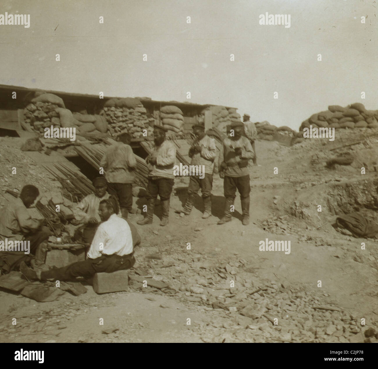 A soldier-cobbler mending boots in a Russian redoubt Stock Photo - Alamy