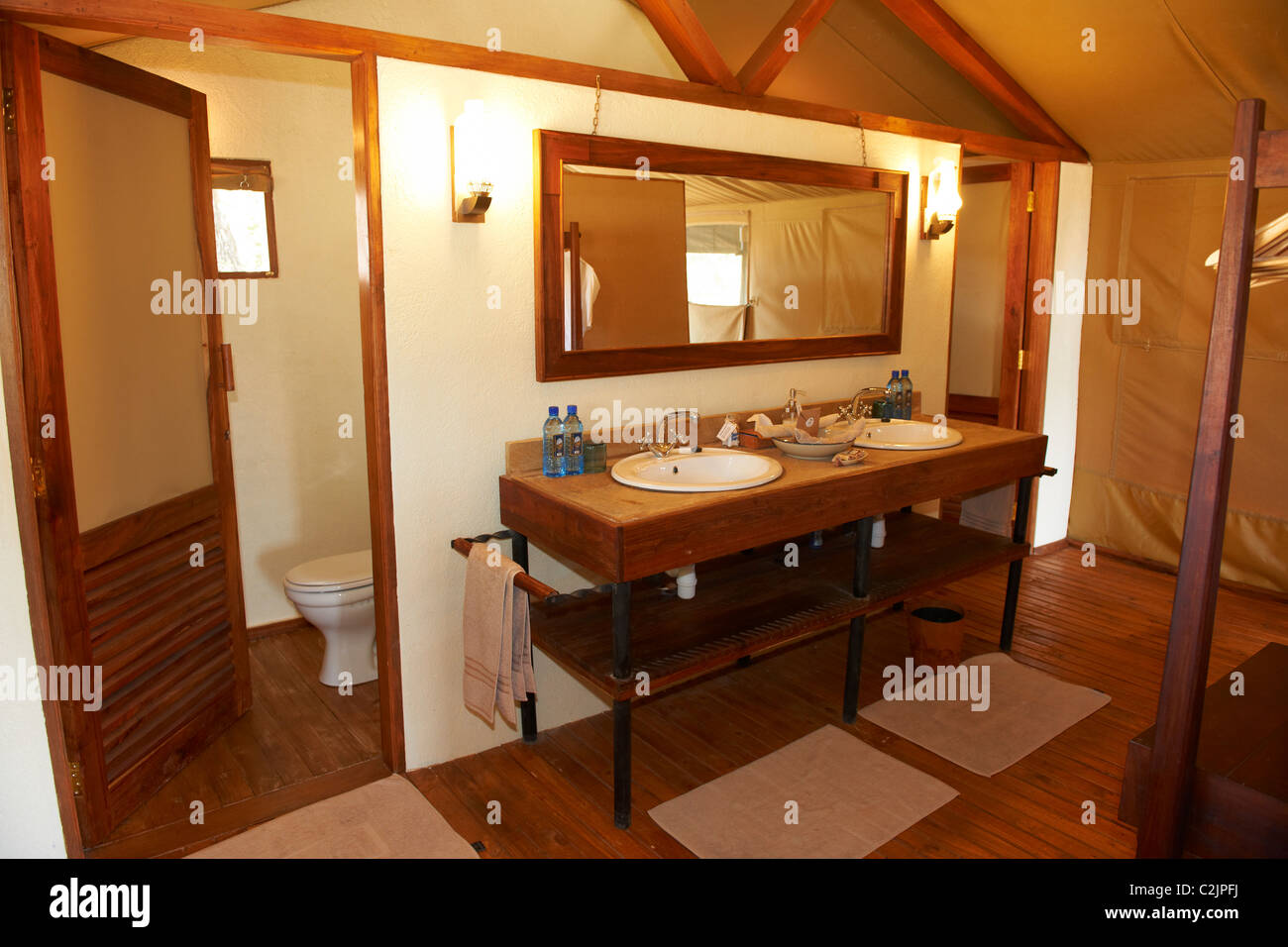 wash basin in bath room of luxury lodge Sanctuary Kusini Tended Camp