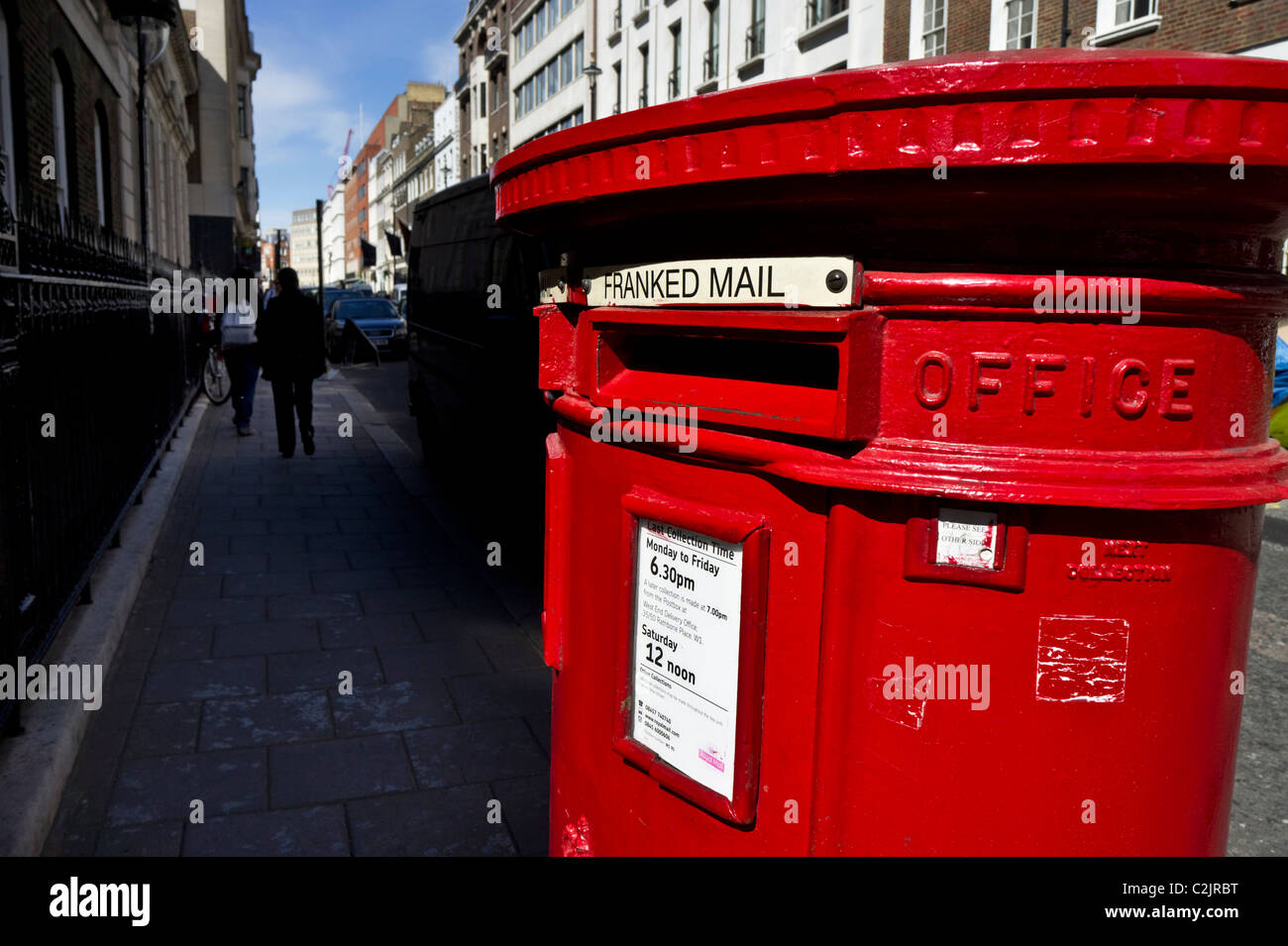 Red post office letterbox in London, England, UK Stock Photo