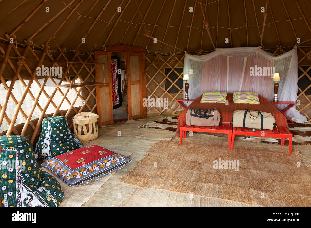 interior shot of  luxury sleeping room in tent of Nduara Loliondo Tended Safari Camp, Serengeti, Tanzania, Africa Stock Photo