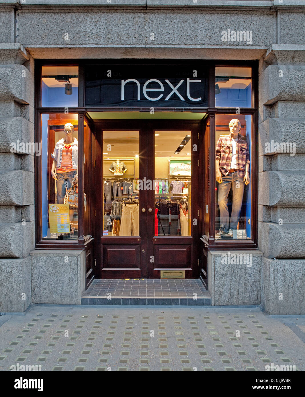 Next clothing store in The City of London in the evening Stock Photo