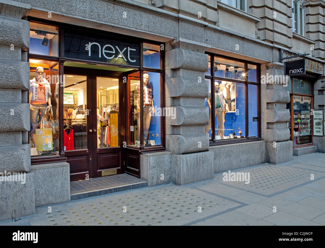 Next clothing store in London in the evening Stock Photo