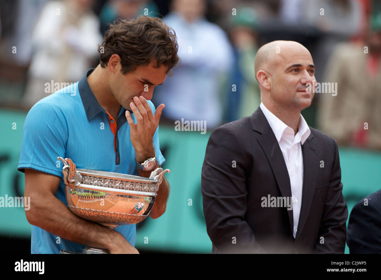 Roger Federer, Switzerland, at the trophy presentation with Andre Agassi after winning the French Open Tennis Final, Paris. Stock Photo