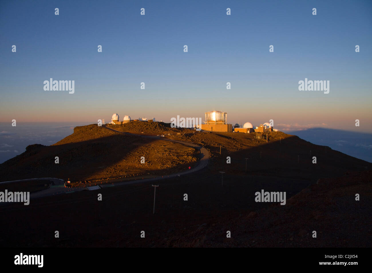 Science City observatories at the top of Haleakala volcano on Maui at dawn Stock Photo Alamy
