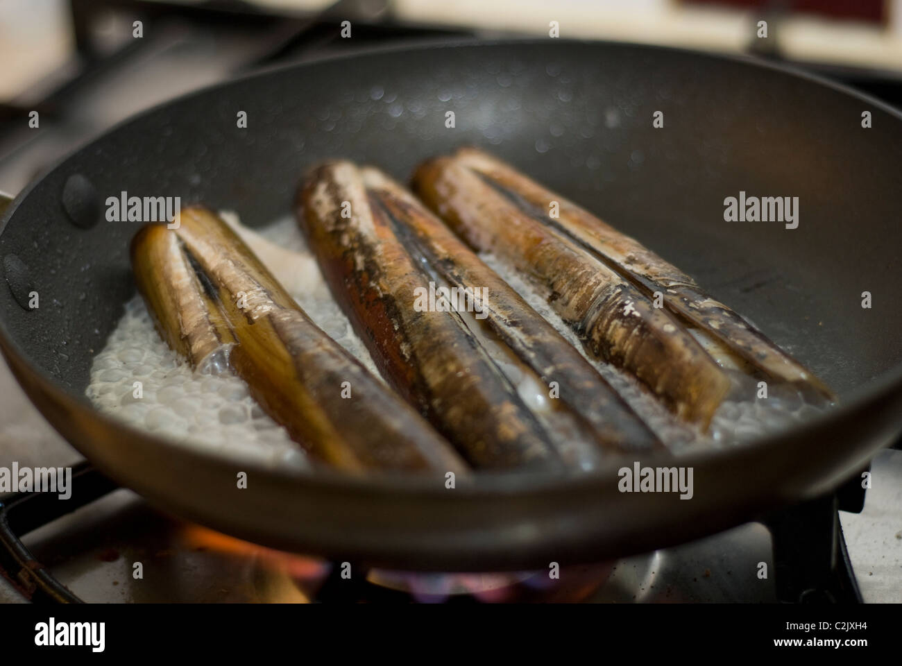 Eating razor clams hires stock photography and images Alamy