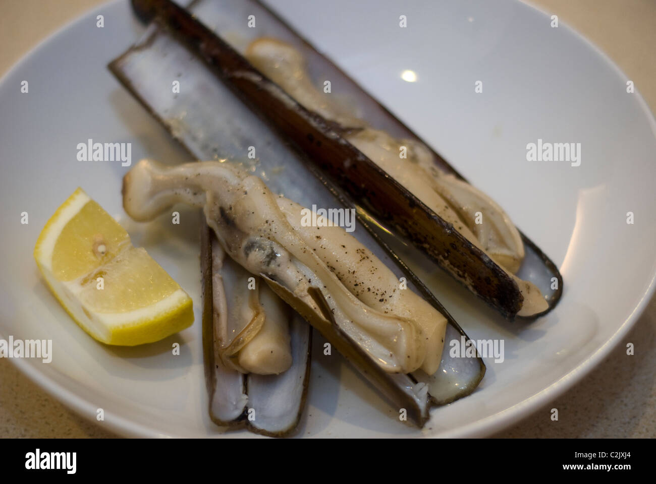 Eating razor clams hires stock photography and images Alamy