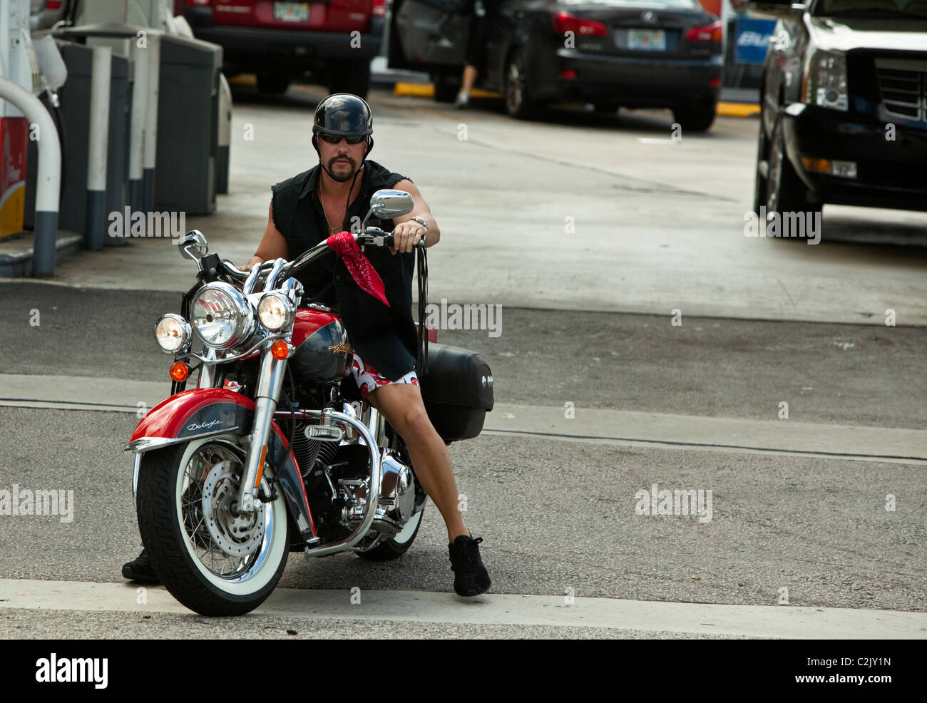 Street photography of a motorcyclist riding a bike, Miami, Florida, USA. Stock Photo