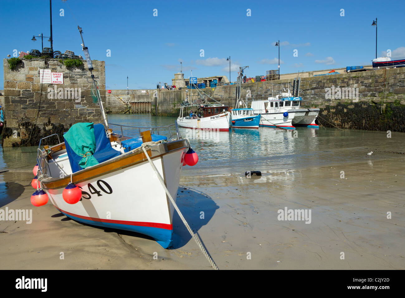 Boats in Newquay harbour at low tide, Cornwall UK. Stock Photo