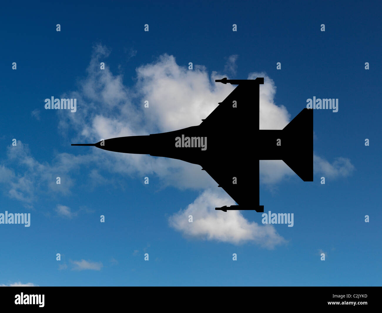 Aircraft silhouetted in a blue sky Stock Photo