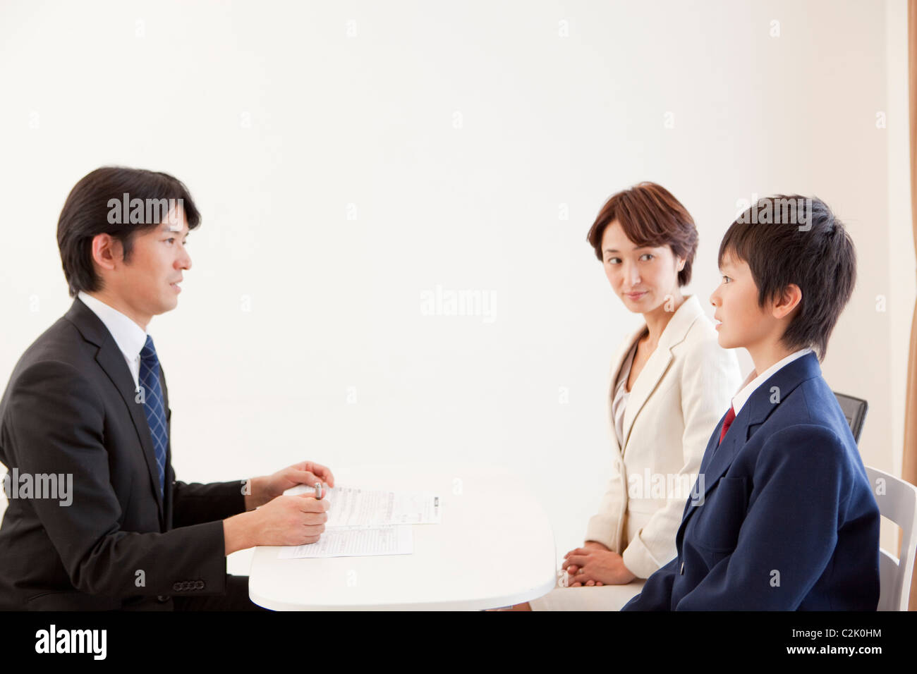 Parent teacher student table meeting hi-res stock photography and ...