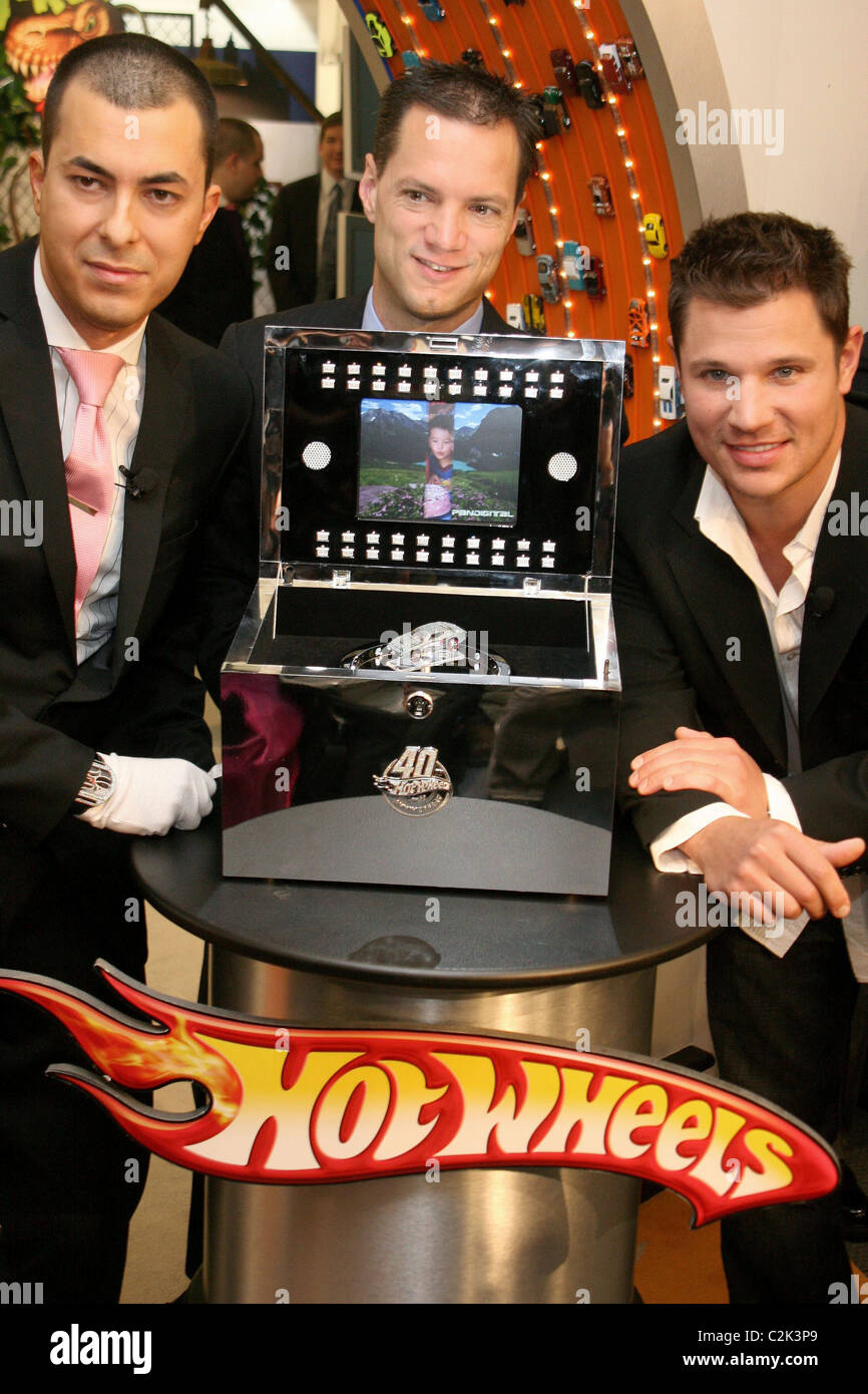 Jason Arasheben (CEO and owner of Jason of Beverly Hills), Geoff Walker (  VP of Hot Wheels marketing) and Nick Lachey Hot Stock Photo - Alamy