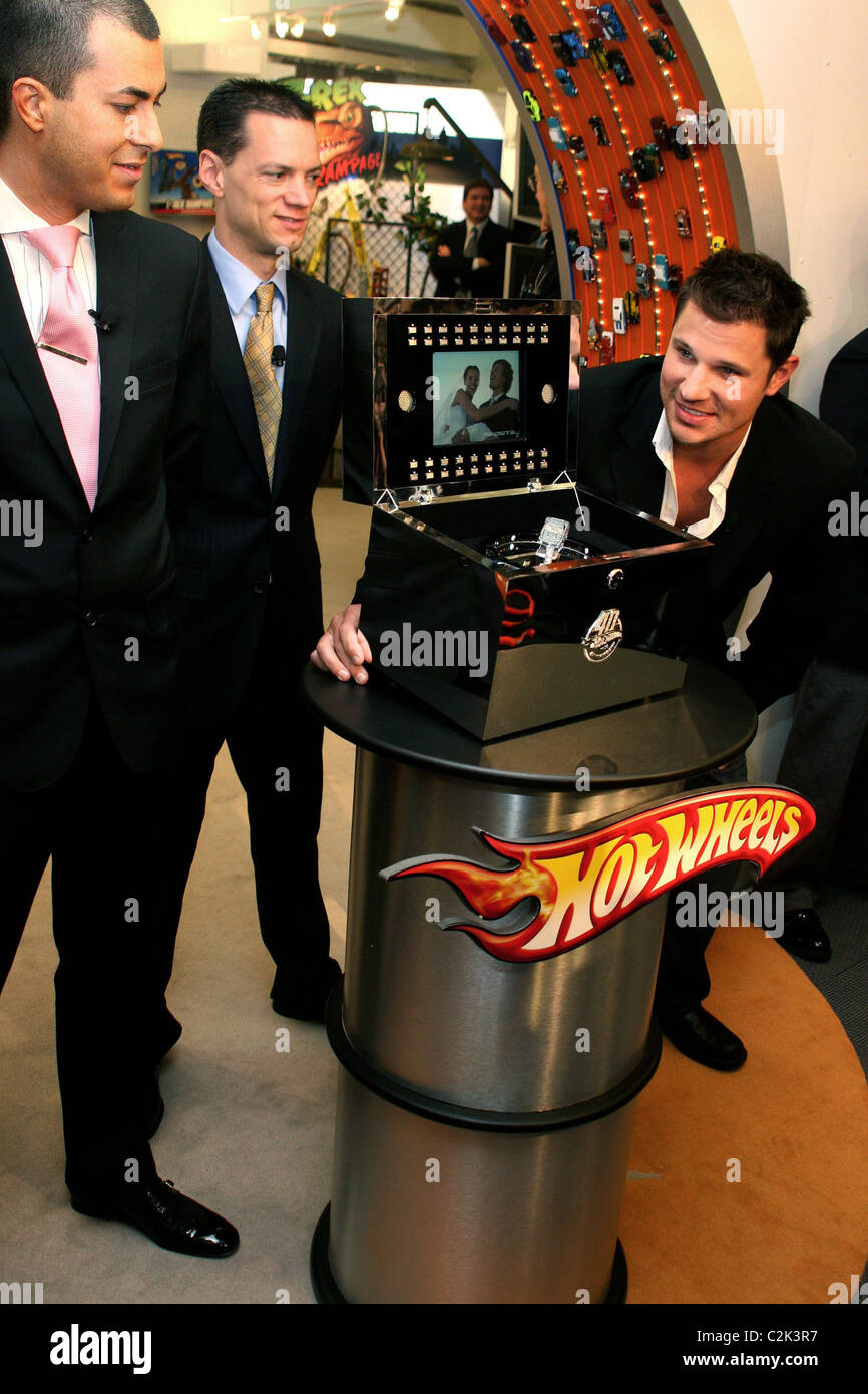 Jason Arasheben (CEO and owner of Jason of Beverly Hills), Geoff Walker (  VP of Hot Wheels marketing) and Nick Lachey Hot Stock Photo - Alamy