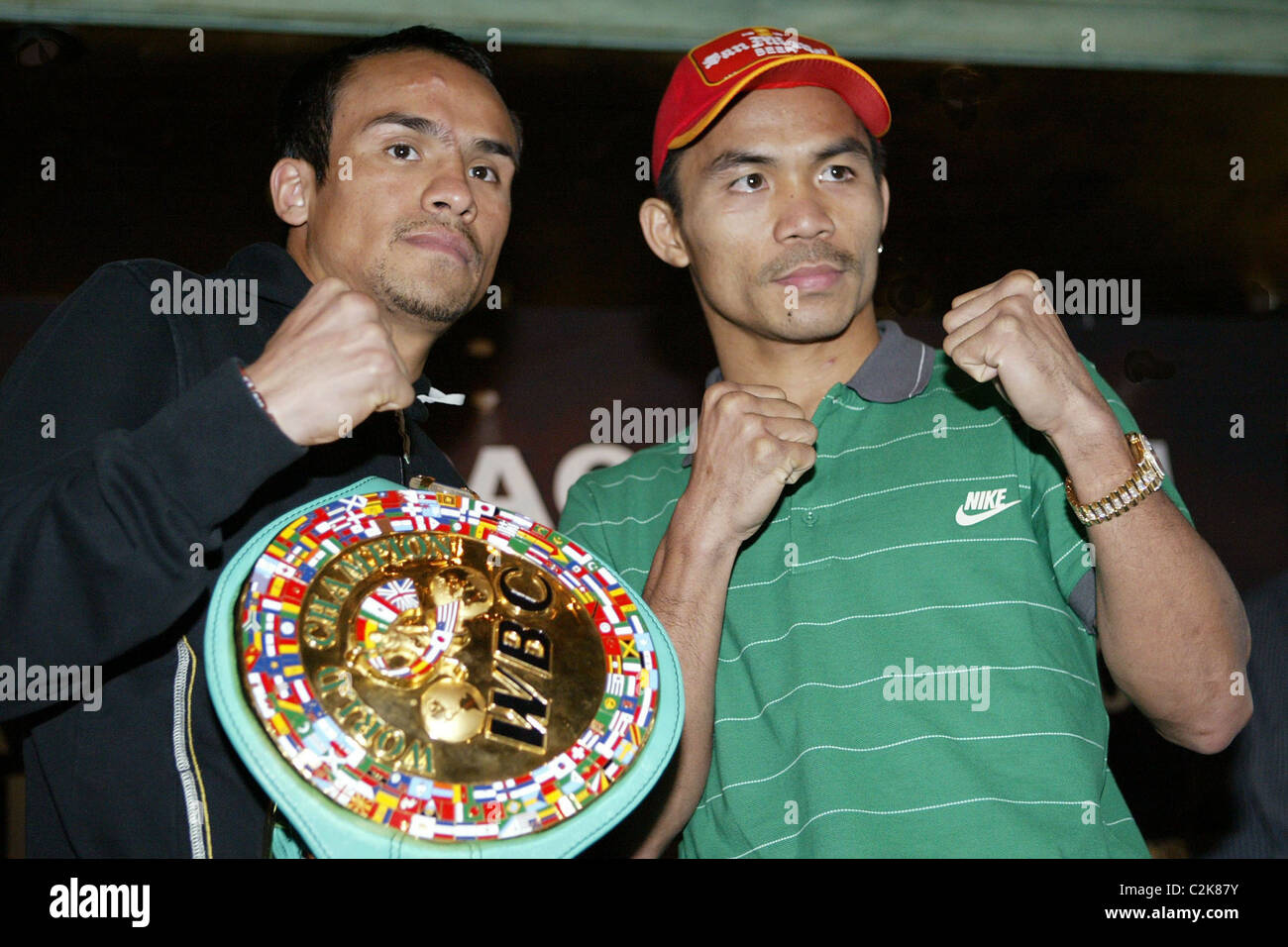 Juan Manuel Marquez and Manny Pacquiao WBC World Super Feather weight  Champion Juan Manuel Marquez faces off with WBC World Stock Photo - Alamy, image size:1300x956
