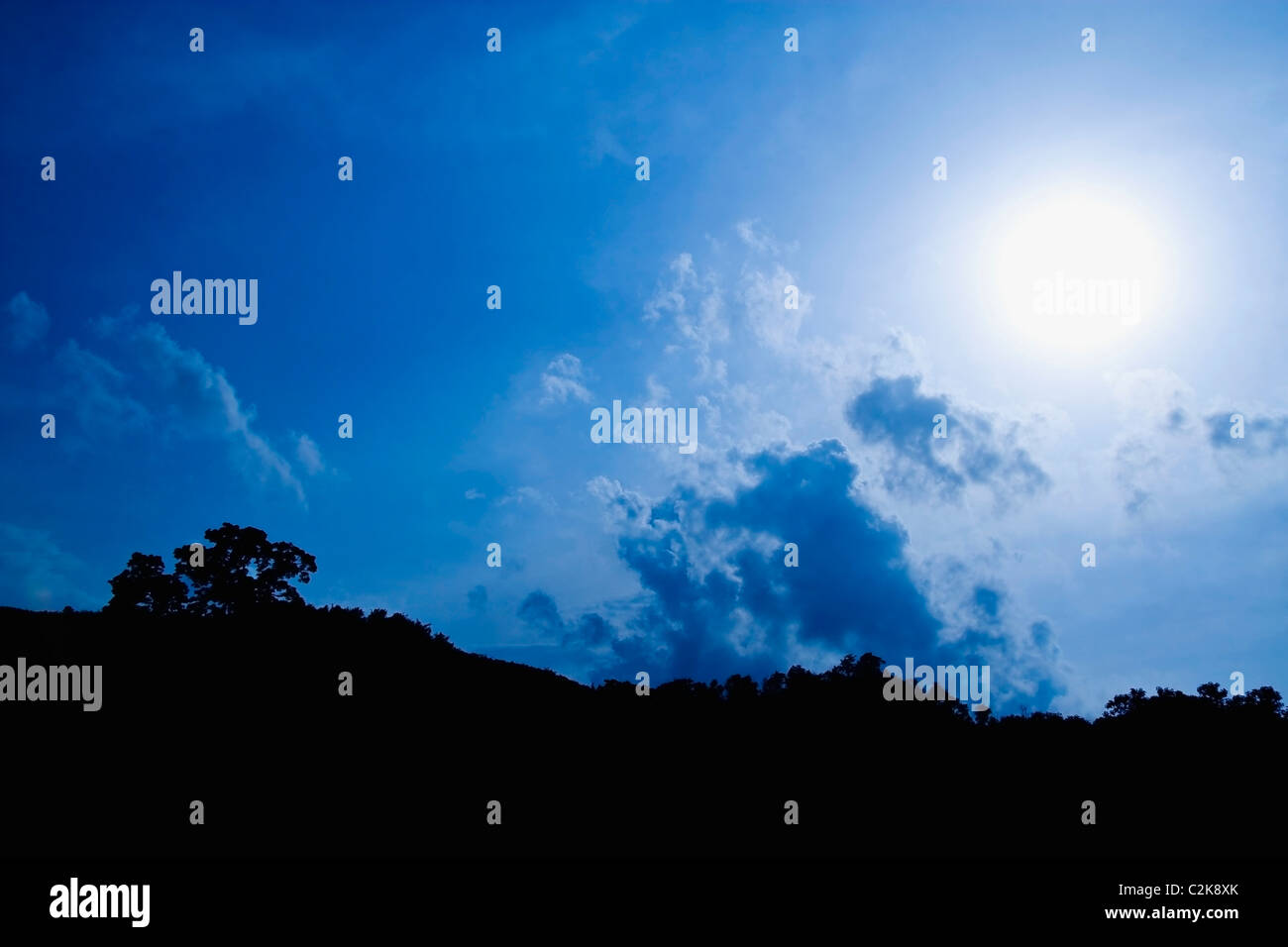 The Sun Shining Through The Clouds Stock Photo - Alamy