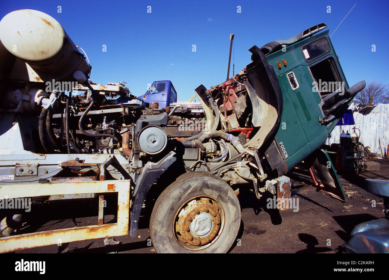 lorry being dismantled in scrapyard uk Stock Photo