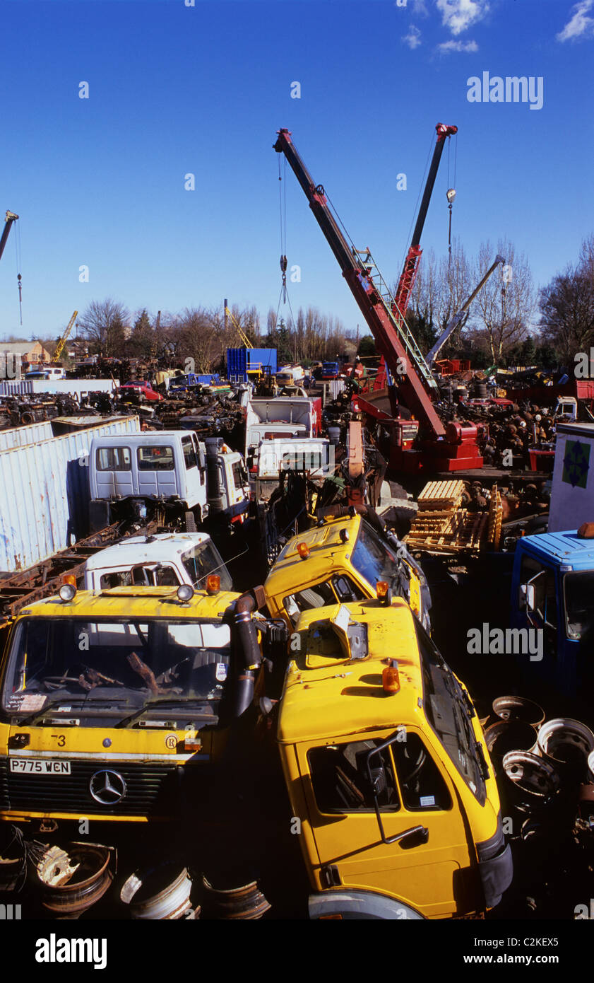 lorries and scrapmetal in scrapyard uk Stock Photo