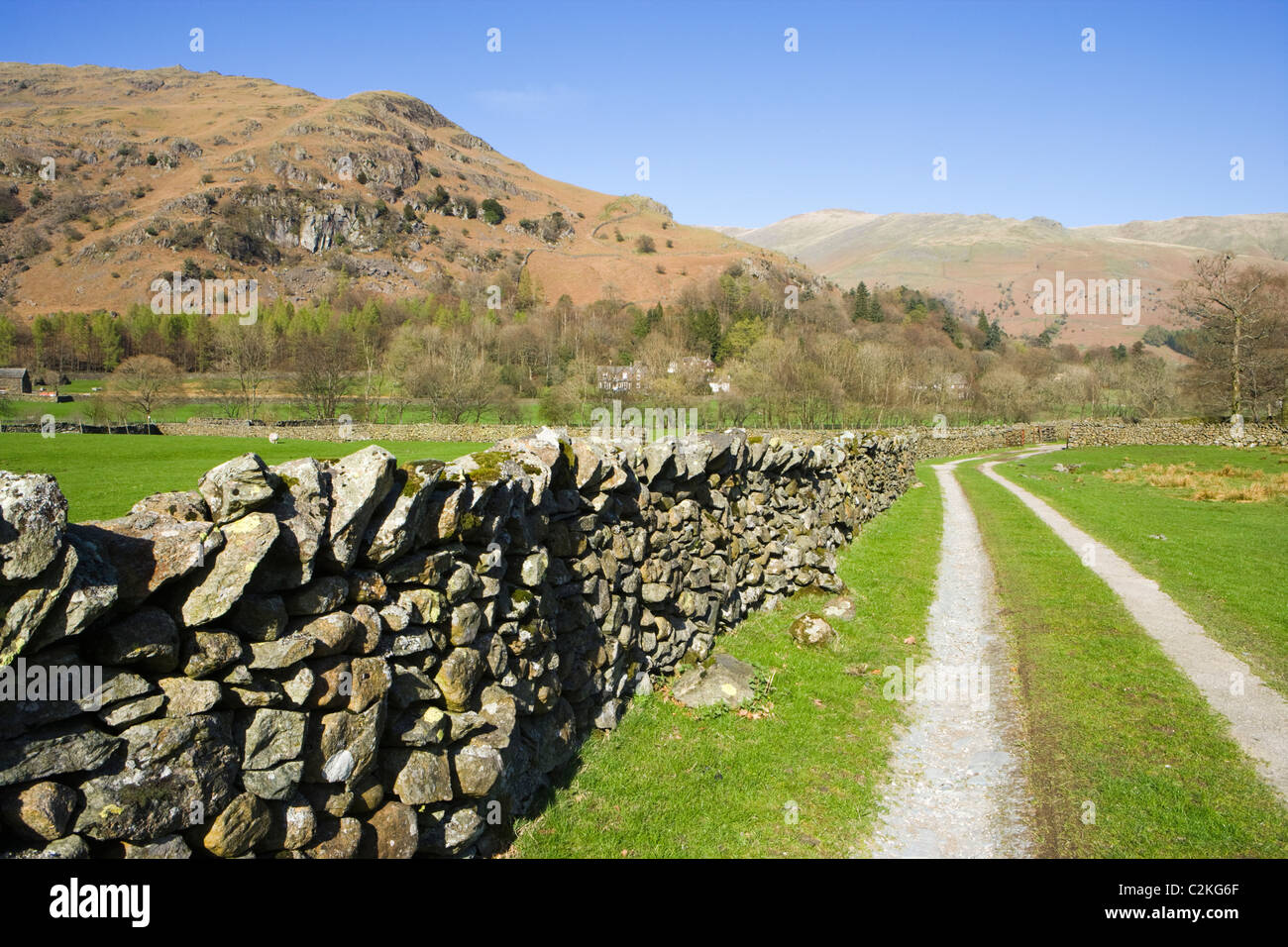 Track and drystone wall, Grasmere, Lake District National Park, Cumbria, UK Stock Photo