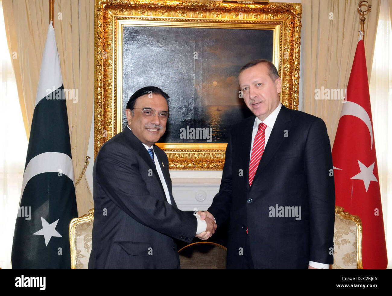 President, Asif Ali Zardari shakes hands with Turkey Prime Minister, Tyyab Erdogan during meeting at PM Residence in Ankara Stock Photo