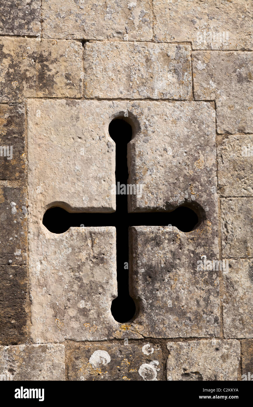 Cross arrow slit at Titchfield Abbey ruin near Fareham in hampshire Stock Photo