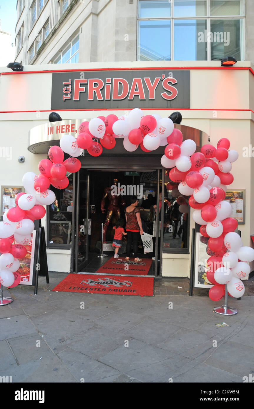 TGI Friday's restaurant Leicester Square London balloons entrance marketing  Stock Photo - Alamy