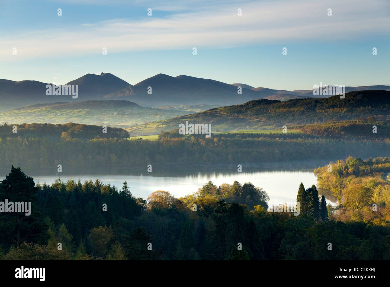 Autumn view across Castlewellan Lake to the Mourne Mountains. Castlewellan Forest Park, County Down, Northern Ireland. Stock Photo
