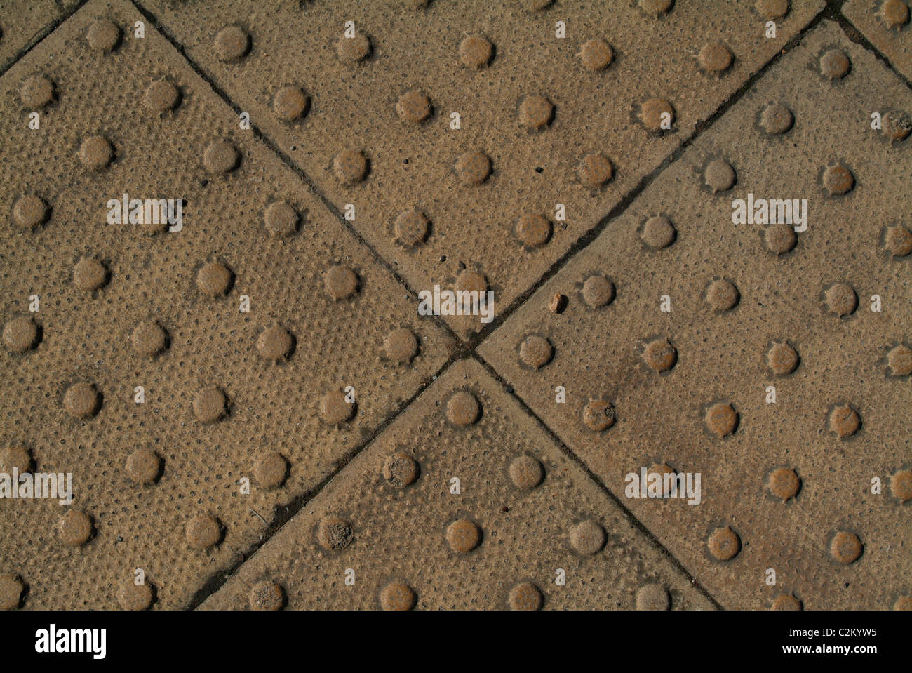 Backgrounds - textured dimpled paving blocks Stock Photo - Alamy