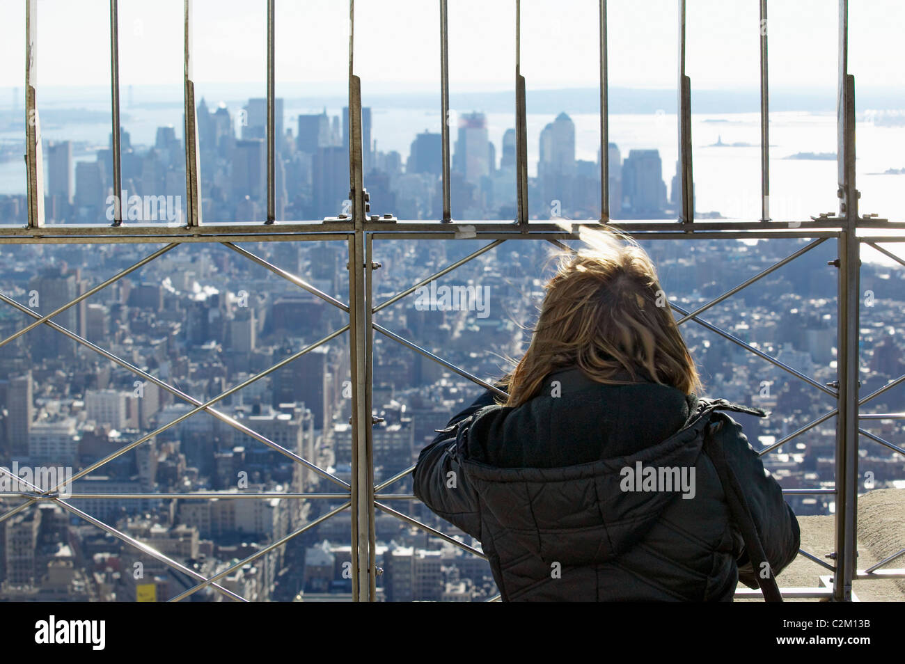 Observation Deck Of The Empire State Building New York City With Woman Safety Railings And View Stock Photo Alamy