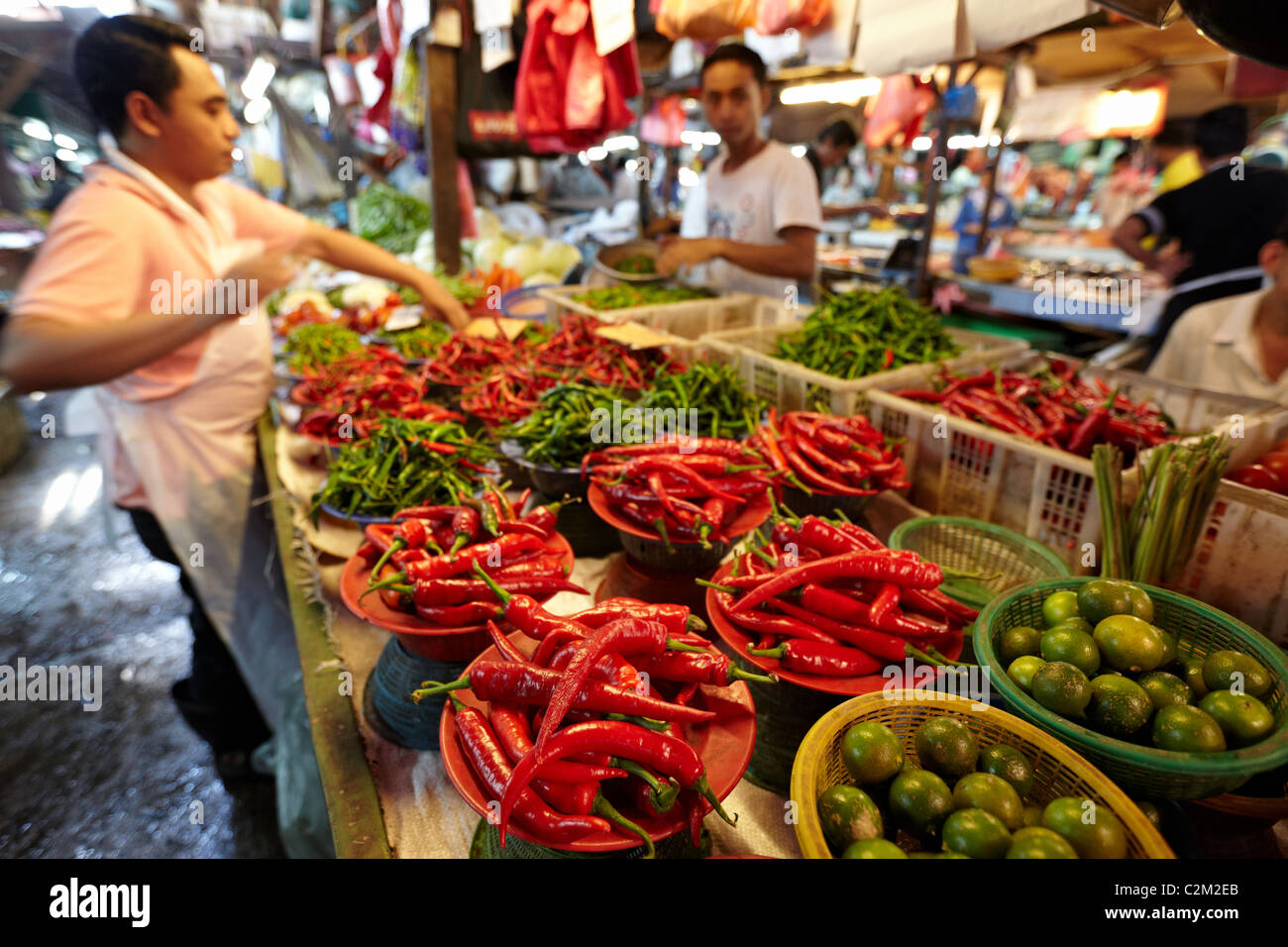 Chillies, fruit, vegetables, meat and fish for sale at the Chow Kit Market in Kuala Lumpur, Malaysia Stock Photo