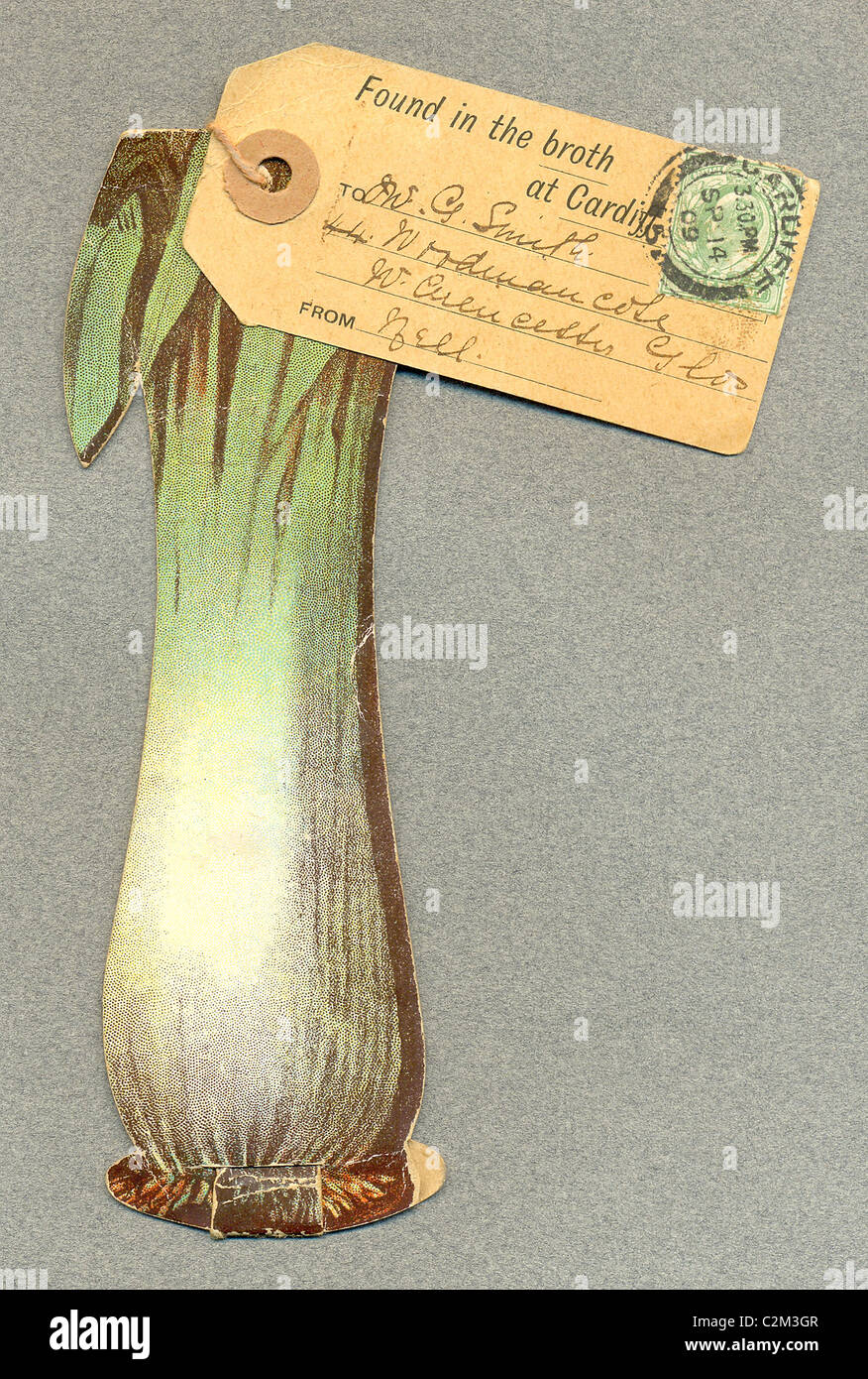 die cut postcard  of a leek enclosing fold out views of Cardiff Stock Photo