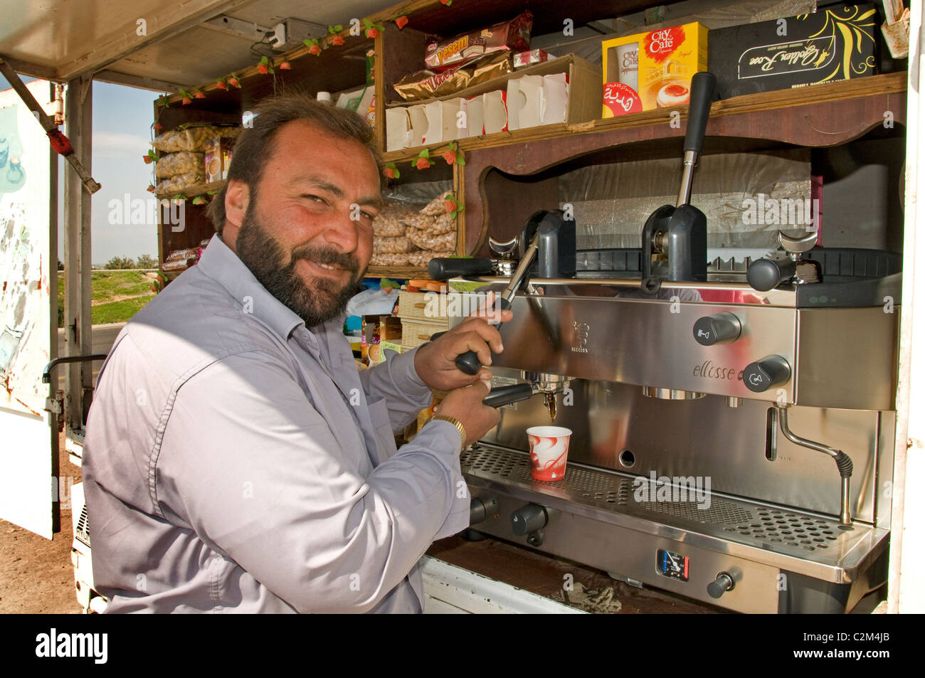 Syria espresso coffee cappuccino traffic bar road to Aleppo Stock Photo