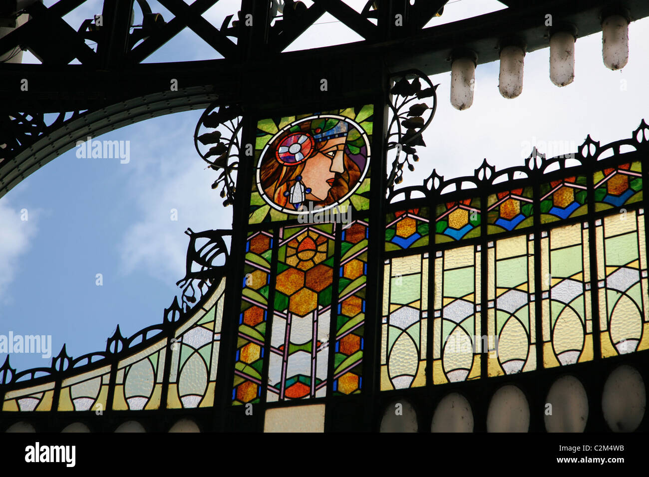 Art Nouveau stained glass decoration by Alfons also Alphonse Mucha at the main entrance to Obecni Dum Municipal House a civic building that houses Smetana Hall, a celebrated concert venue in Nove Mesto district in Prague Czech Republic Stock Photo