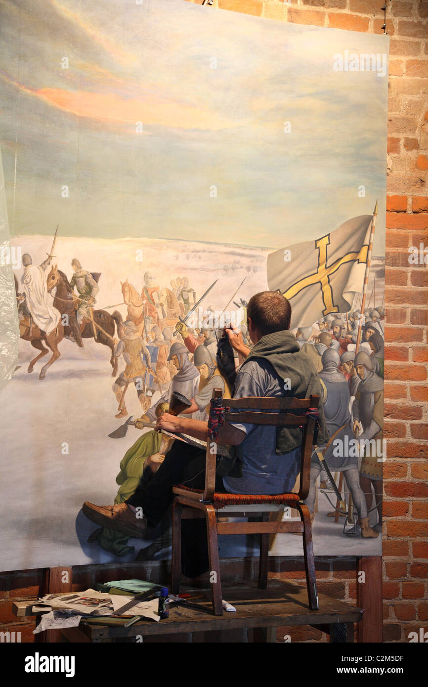 A man painting in the Tower of Kamjanec, Kamjanec, Belarus Stock Photo